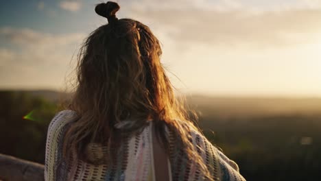 Pretty-caucasian-female-model-overlooking-sunset-from-viewpoint