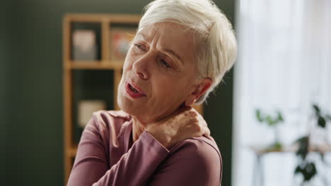 senior woman experiencing neck pain and muscle stiffness