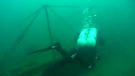 scuba diver explores the goldrush paddlewheel aj goddard