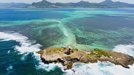 aerial drone view of a lighthouse on ile aux fouquets, ile au phare, bois des amourettes, mauritius