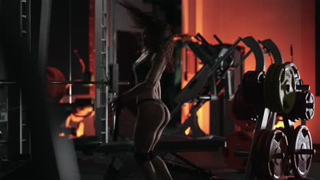 A-young-beautiful-sexy-woman-dances-beautifully-in-the-gym.-Modern-choreography-in-the-gym.-Dancer