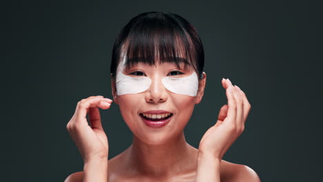 woman with eye patches