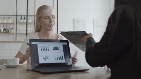 young female customer meeting with financial advisor