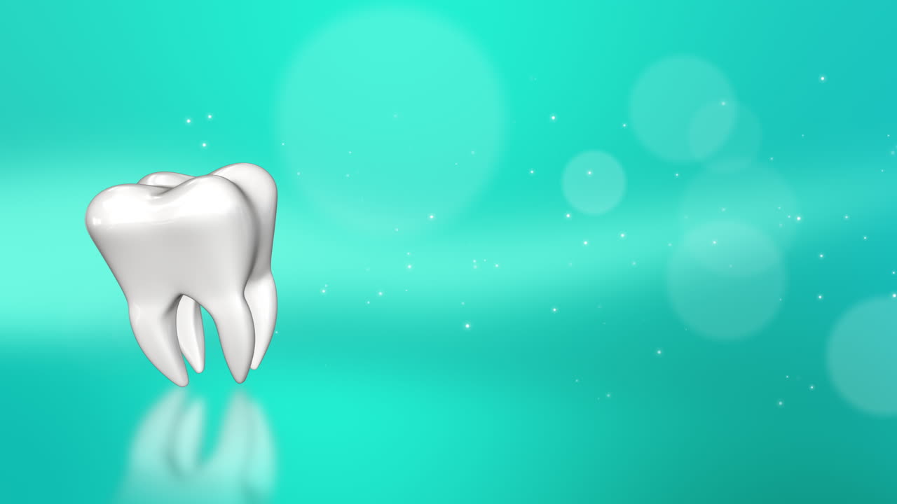 3D model of a white corner tooth. Animated looped medical dental screensaver. Abstract green background with bokeh. Copy space.