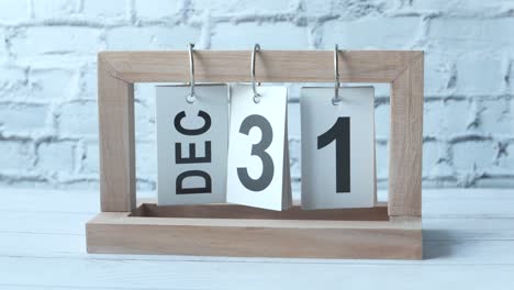 wooden calendar showing december 31st