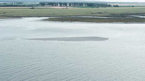 time lapse of aerial view of mont saint michel tide from the top of the hill, france