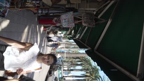 people walking along central market in casablanca, morocco - vertical