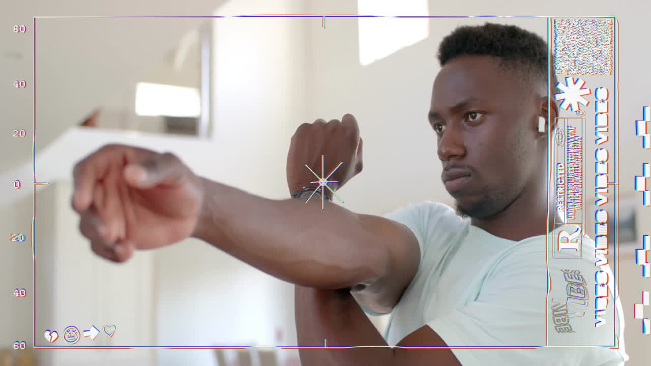 Exercising with fitness animation overlay, focused man stretching arm