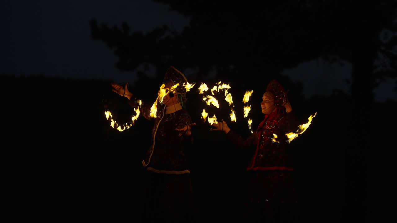 Fire Dancers at Night
