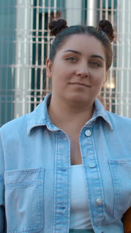 portrait of a woman wearing a denim jacket