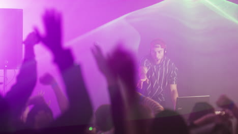 dj playing music at a concert
