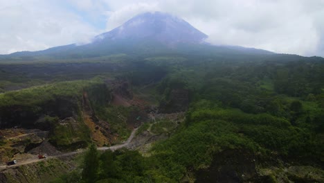 active open pit mine at foot of mount merapi, java, indonesia, aerial view