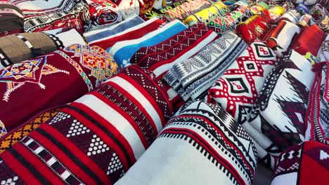 pile of colorful patterned blankets