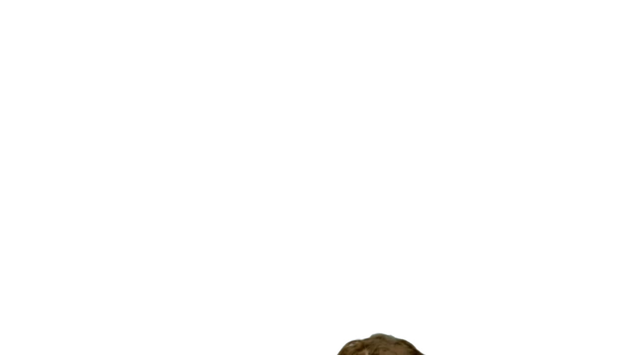 Attractive man jumping in front of the camera on white background