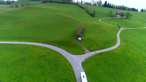 Aerial-View-Transportation-Post-Bus-in-Suburban-Village-Switzerland