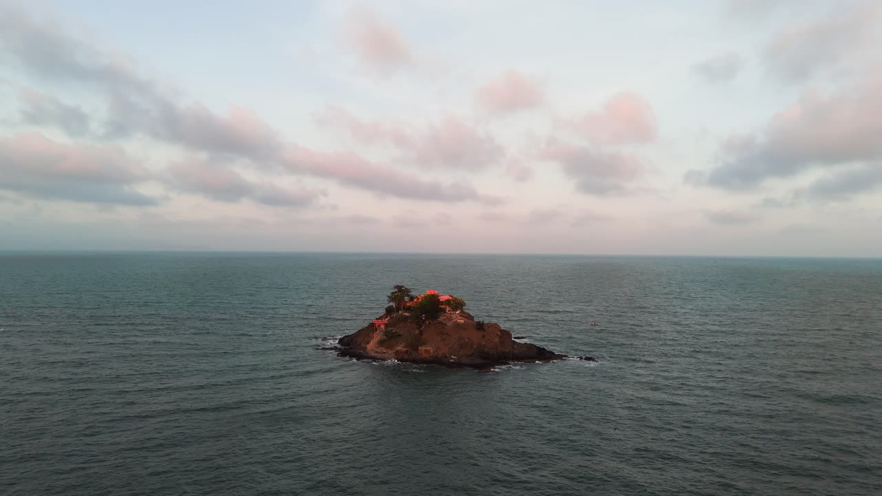 Aerial View Dolly of the Island near Vung Tau in the Evening.