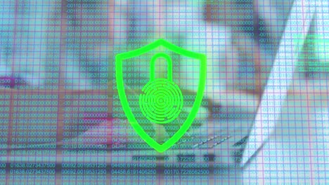 Animation-of-padlock-in-shield-over-numbers-against-cropped-hands-of-caucasian-woman-using-laptop