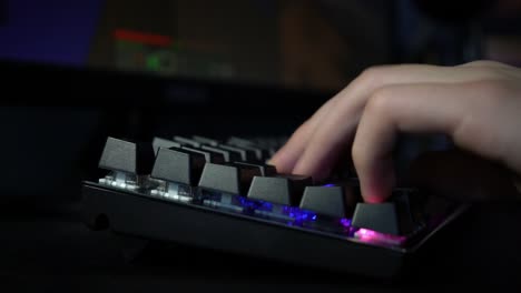 addicted minecraft gamer using gaming keyboard