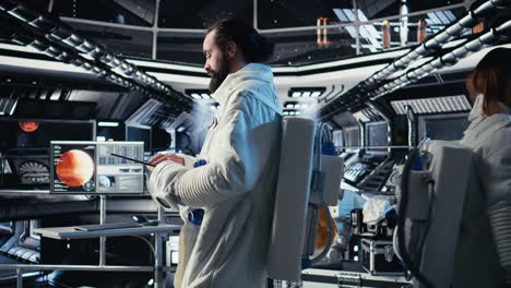 astronaut monitoring life support systems before stepping out of space station
