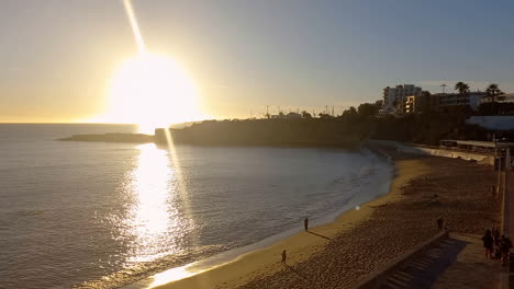 sunset on são pedro beach, with the calm sea waters transmitting a good tranquility