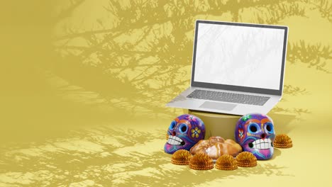 Tag-Der-Toten-Festival,-Dia-De-Muertos,-Design-Mockup,-Mexiko,-Laptop,-Totenköpfe,-Traditionelle-Blumen-Und-Gebäck,-Gelber-Hintergrund