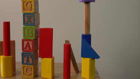 wooden cube tower with letters, children's toy