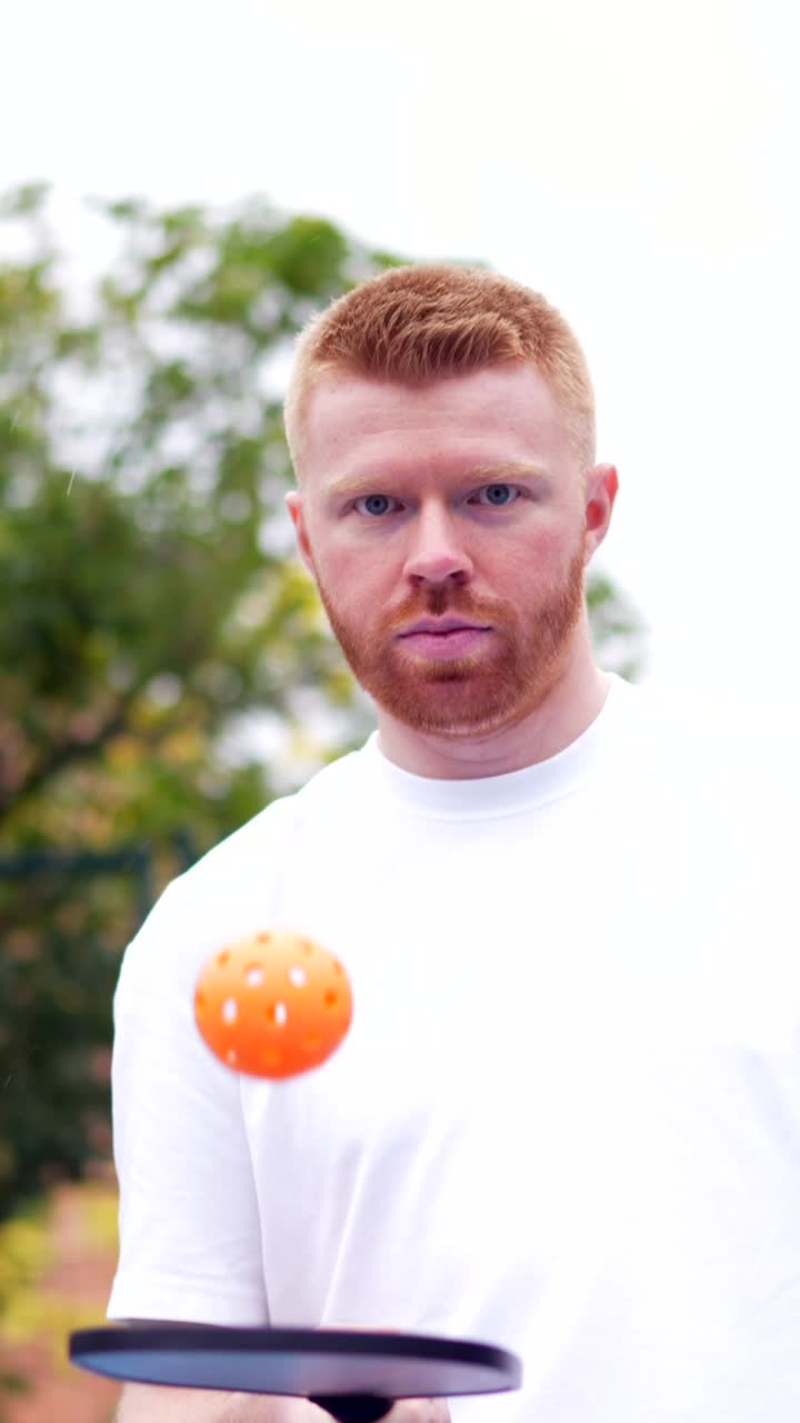 Portrait of a man playing pickleball