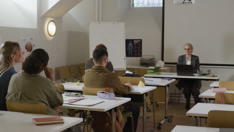 classroom lecture with students and teacher