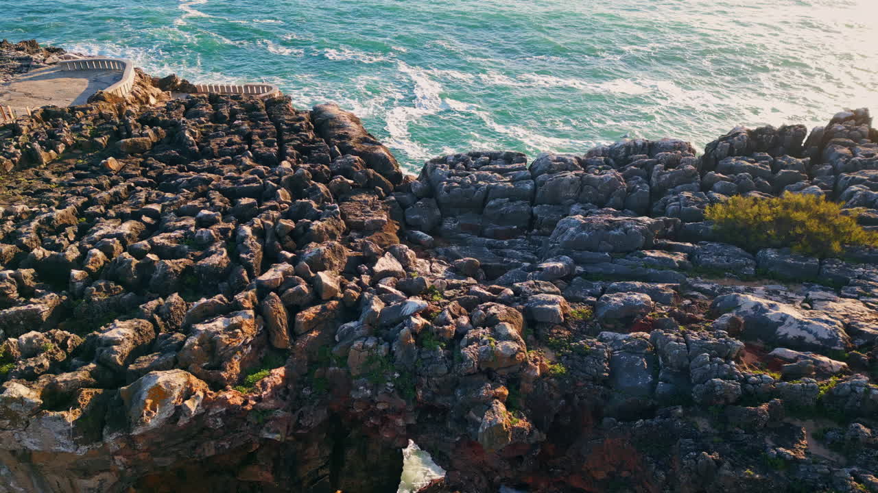 Stunning drone rocky seashore beautiful sunny day. Dangerous coastal cliffs.