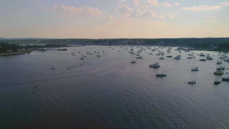 massachusetts harbor with boats and sailboats, sunny, - drone video