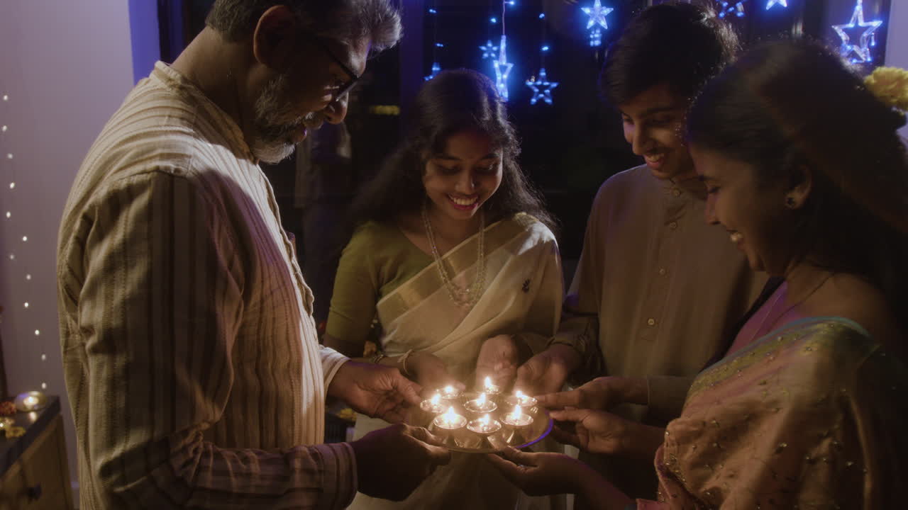 Family Celebrating Diwali with Lights
