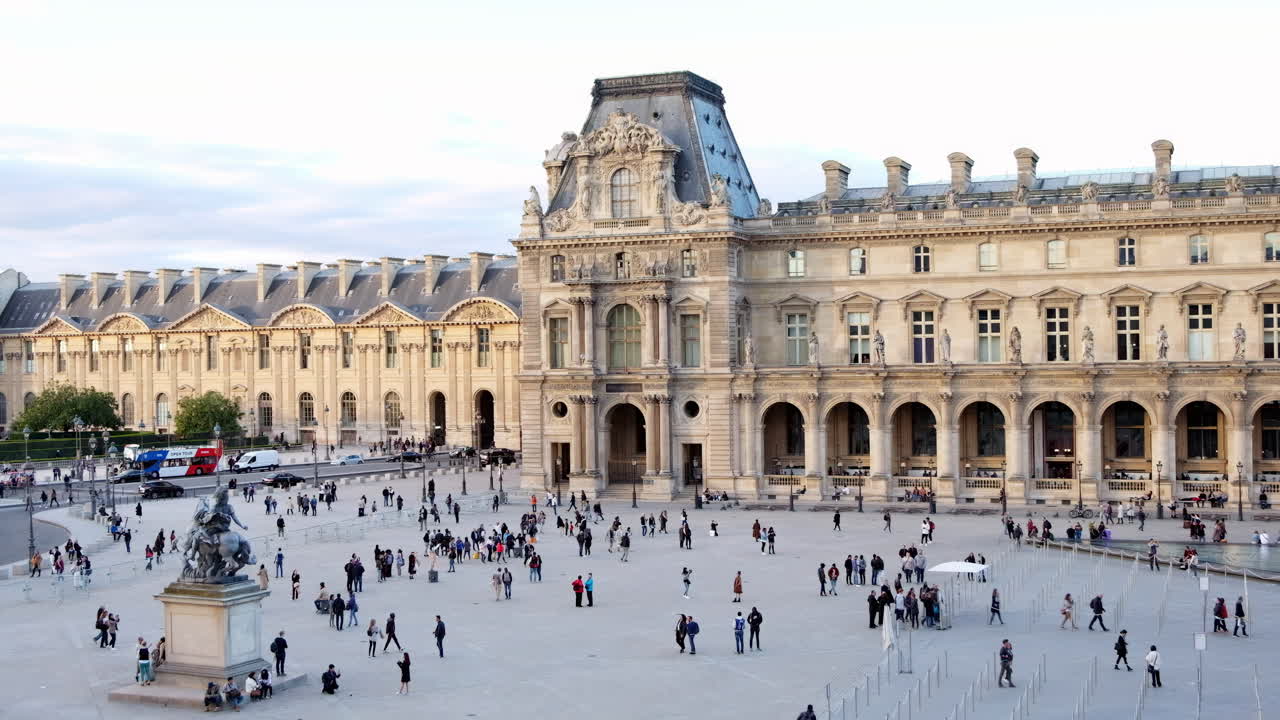 Paris, France - November 21, 2021: Front view of the Louvre Museum in daylight