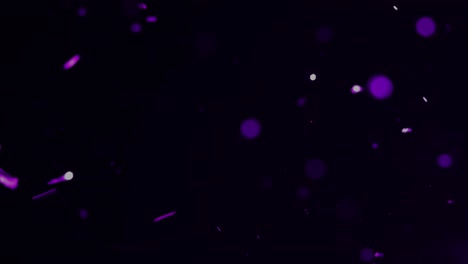 una ráfaga de destellos púrpuras y bolas de bokeh para la superposición de películas y efectos especiales