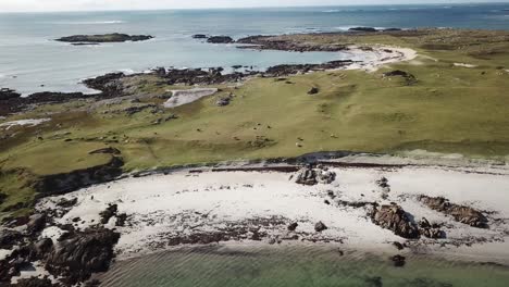 aerial,-push-in:-connemara-landscape-next-to-the-atlantic-ocean,-sandy-beaches-and-meadows