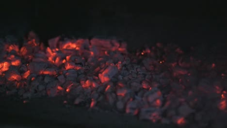 a fire burning in a stone furnace filmed