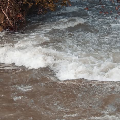 white mountain stream water falling down