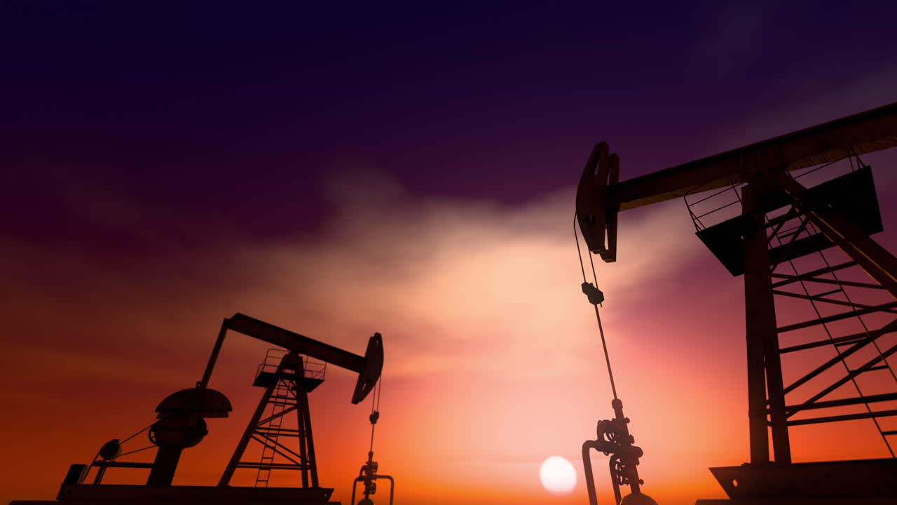 Silhouette of working oil pump jacks against a dramatic beautiful sunset sky. Looping 3D Animation
