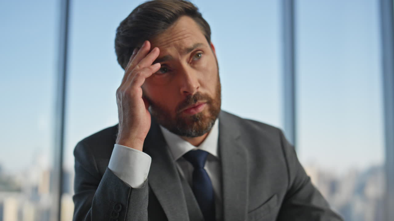 Office manager suffering migraine thinking problem. Closeup hand dropping pen