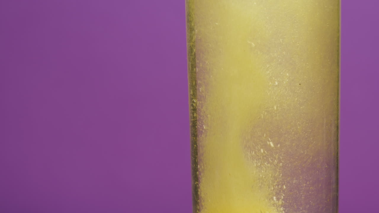 Effervescent tablet vitamin C nutritional supplements in glass with orange carbonated water.Aspirin antipyretic drugs.Vitamins C pills against flu, medicines. Healthy concept immune system High quality 4k footage