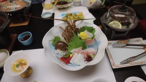 gourmet japanese kaiseki course meal, raw fish and lobsters 4k