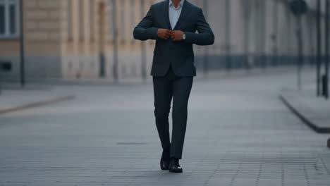businessman walking on an urban street