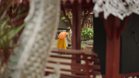 monk in traditional robes at a buddhist temple