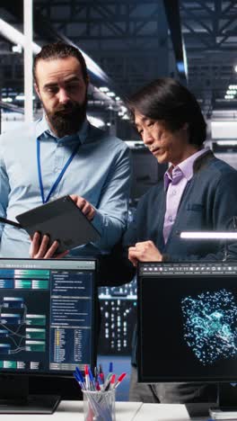 vertical video data center manager supervising developer using device to monitor neural network