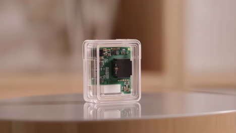 electronic device in a transparent box