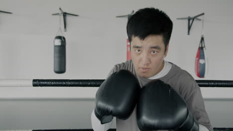 man boxing training session