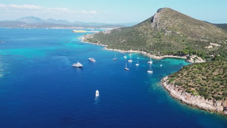 Coastline-and-Spiaggia-di-Cala-Moresca-Beach-in-Golfo-Aranci,-Sardinia,-Italy---4k-Aerial