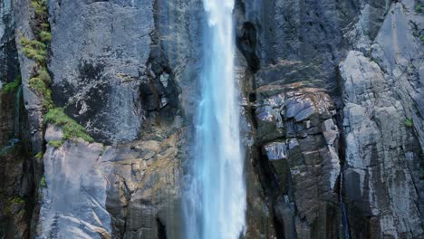majestic waterfall cascading down a rocky cliff