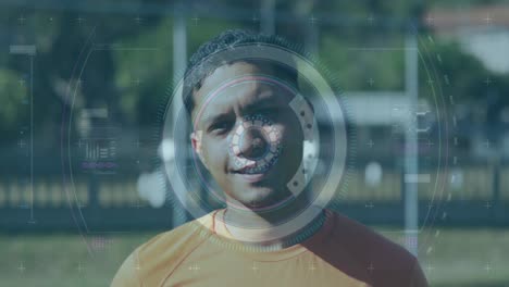 Scope-scanning-over-digital-interface-with-data-processing-against-male-soccer-player-smiling