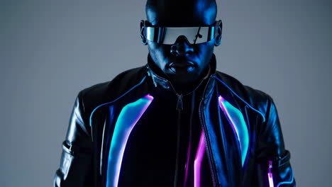 futuristic cyberpunk man in glowing jacket and sunglasses