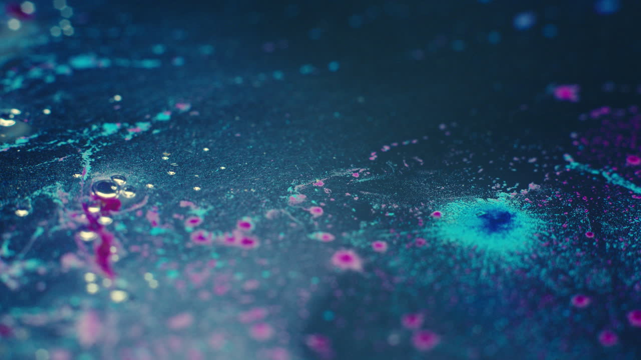 Colourful, organic, liquids macro shots buzzing and flowing